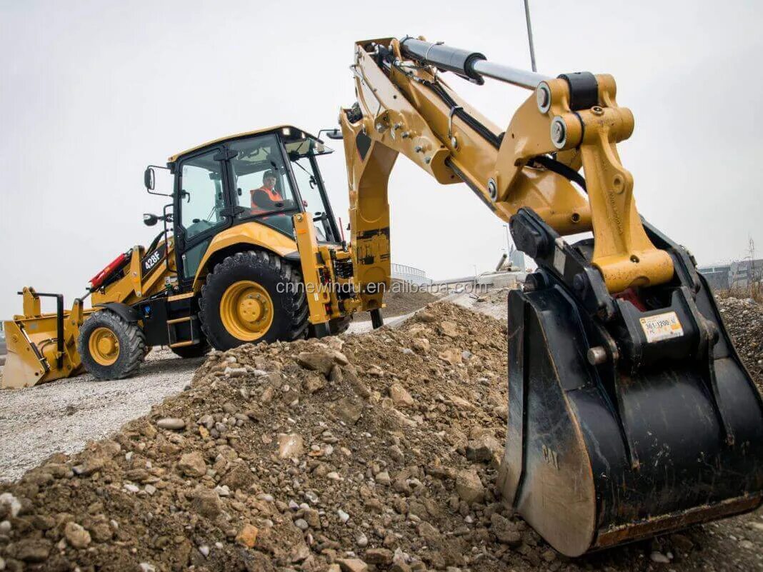 Аренда экскаватора погрузчика в области. Экскаватор-погрузчик Caterpillar 428. Катерпиллер 428f. Трактор Cat 428f2. Экскаватор погрузчик Cat 428f.