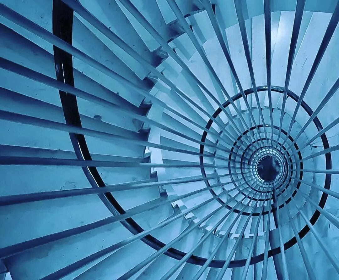 Архимедова спираль в архитектуре. Центр спирали. Концентрические круги. Символ в виде спирали. Центр спирали.