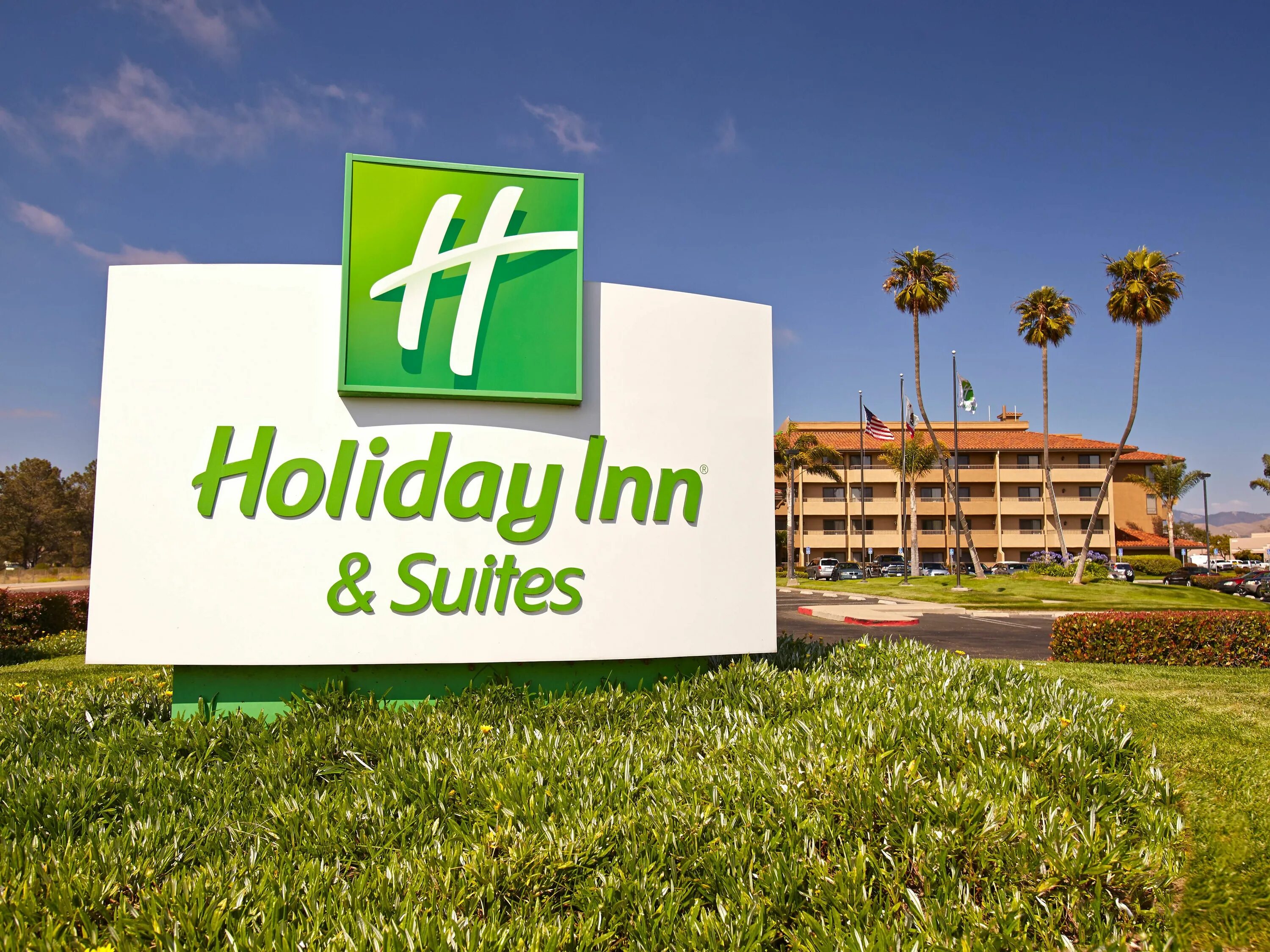 Холидей ИНН. Сеть отелей Холидей ИНН. Holiday Inn вывеска. Holiday Inn фото.