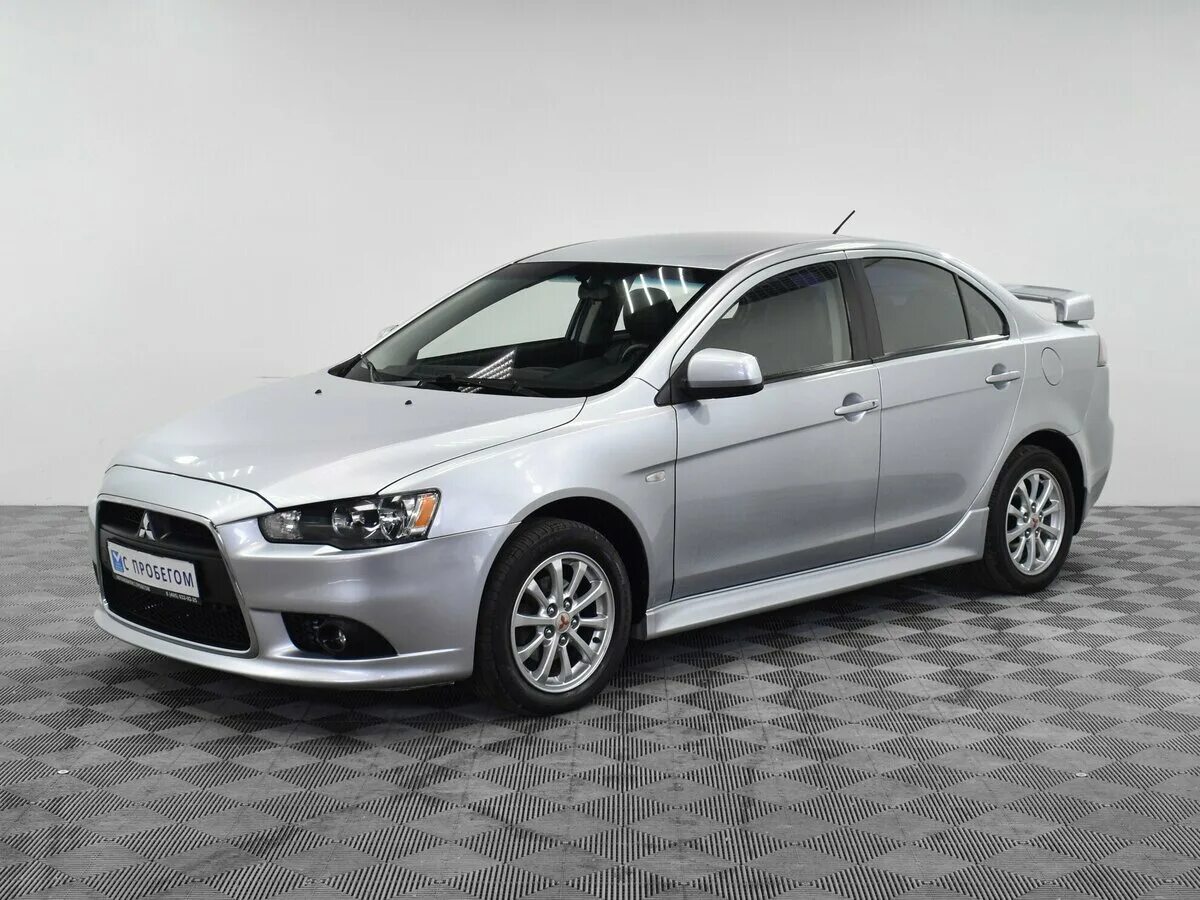 Mitsubishi lancer 2012. Митсубиси Лансер 2012. Митсубиси 2012 седан. Митсубиси Лансер 2012 серебристый. Лансер 1 Рестайлинг.