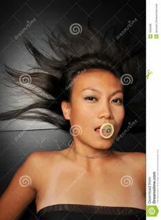 Asian Woman with a Condom in Her Mouth Stock Photo - Image of sensual, asia...