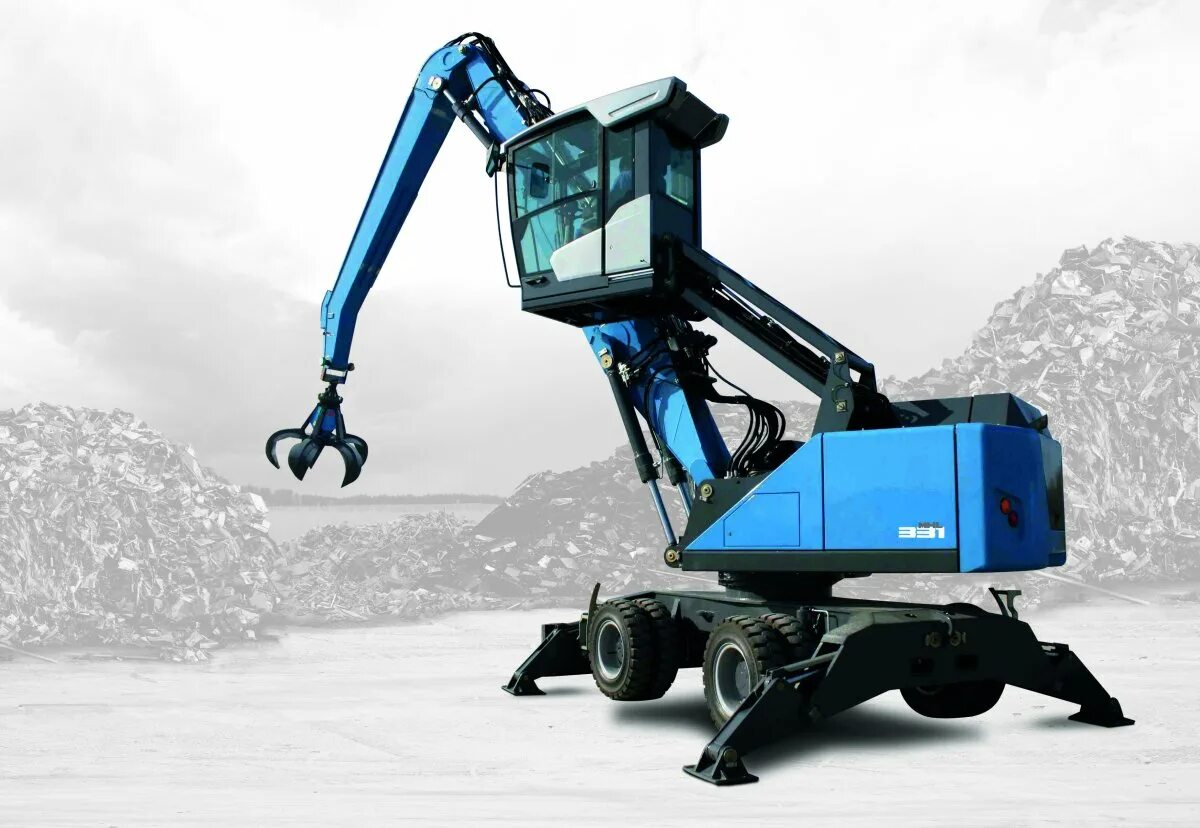 Перегружатели fuchs. Перегружатель фукс 331. fuchs mhl331. terex fuchs перегружатель. погрузчик металлолома фукс.