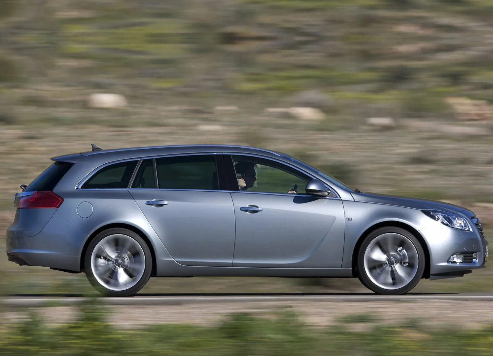 Opel insignia sports. Опель Инсигния 2008 универсал. Opel Insignia Sports Tourer. Opel Insignia Sports Tourer 2010. Opel Insignia 2010 универсал.