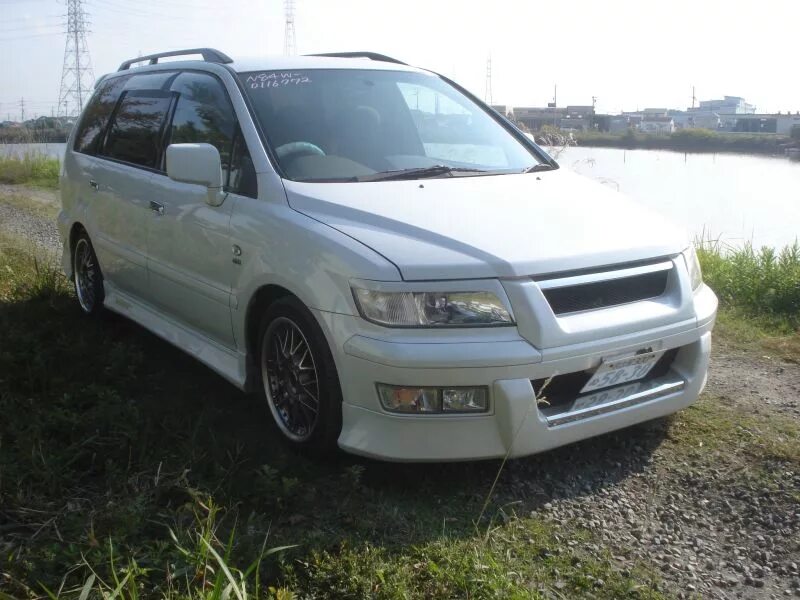 Купить митсубиси шариот грандис. Mitsubishi Chariot Грандис. Mitsubishi Chariot Grandis Tuning. Митсубиши чариог Грандим. Mitsubishi Chariot Grandis 99г..