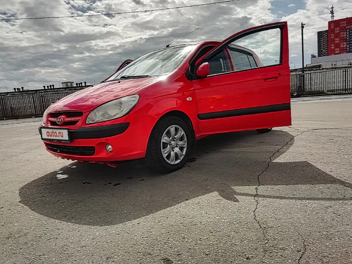 Купить хендай гетц в москве. Хендай Гетц красный. Hyundai Getz 1.4 at. Хендай Гетц 2007. Hyundai Getz красный Getz.