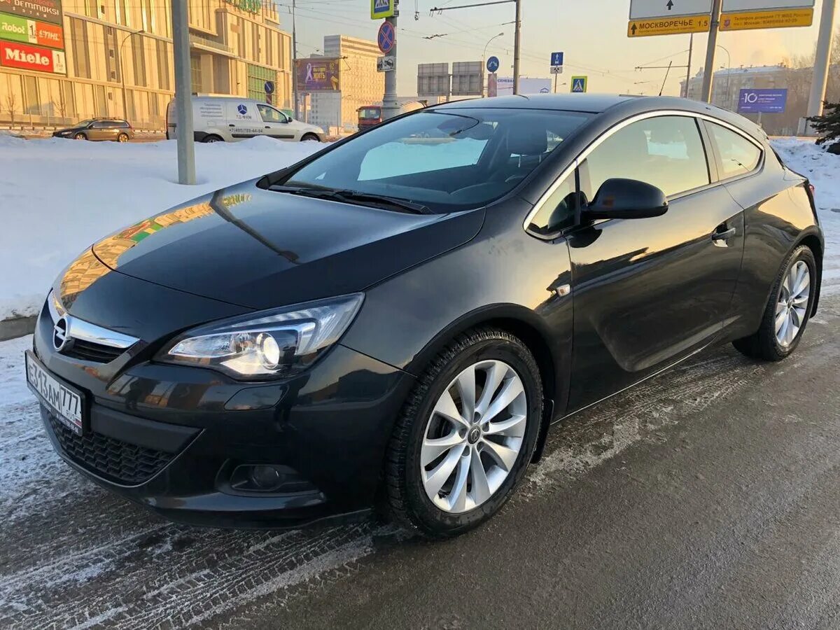 Opel astra черный. Opel Astra GTC 2013 черный. Opel Astra j 2013 хэтчбек. Opel Astra j Рестайлинг 2013.