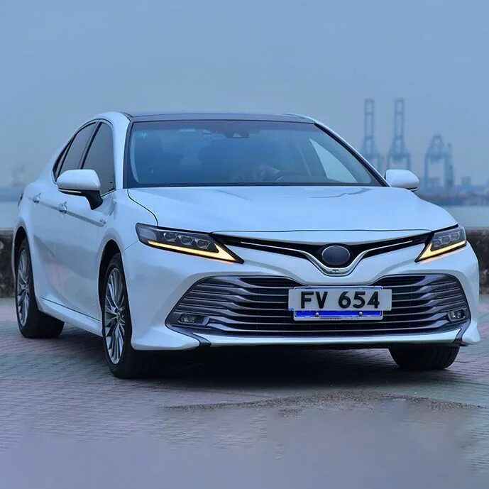 Какой налог на камри. Фара тойота камри 70. toyota camry 2019. передние фары тойота камри 70. фары камри 2019.