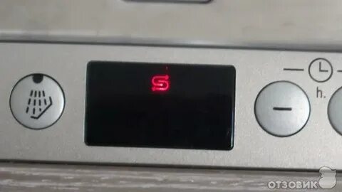 В посудомойке горит значок