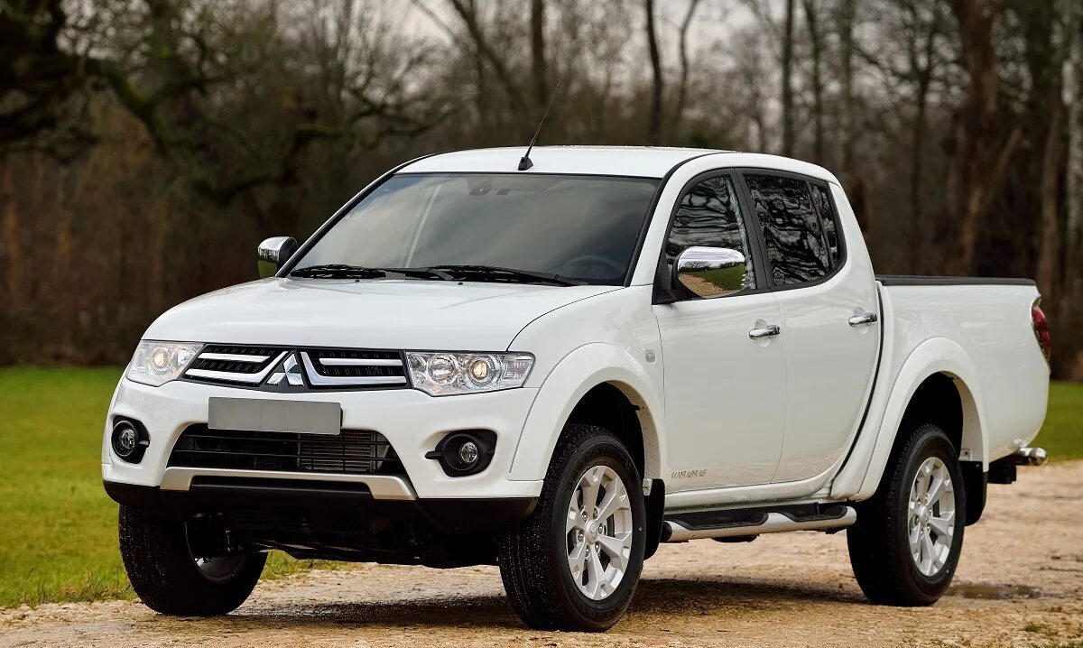 Пикапы mitsubishi l200. Mitsubishi l200. Митсубиси л200. Mitsubishi l200 пикап. Митсубиси л200 200.