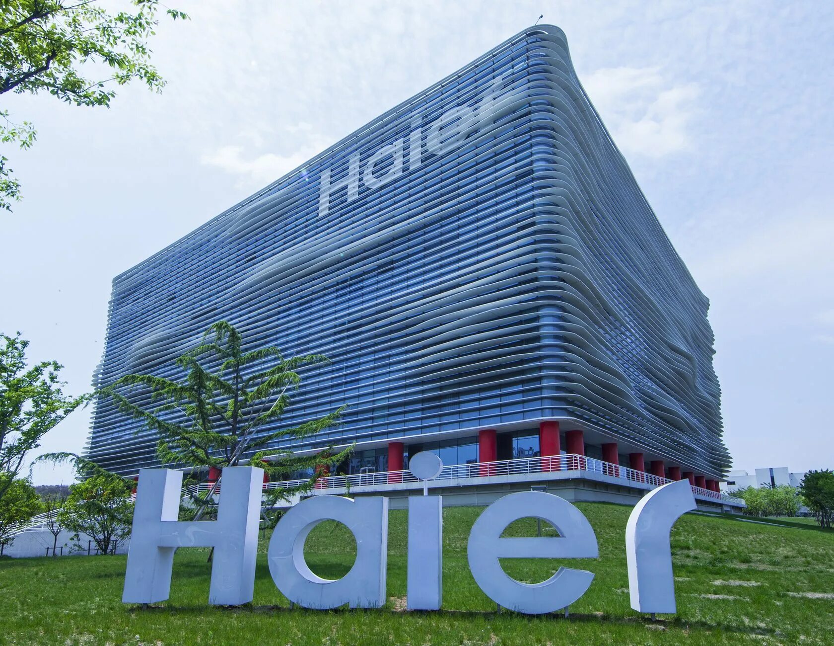 Haier логотип. Надпись haier. Haier штаб квартира. Фирменный магазин хаер. Бренд хайер.