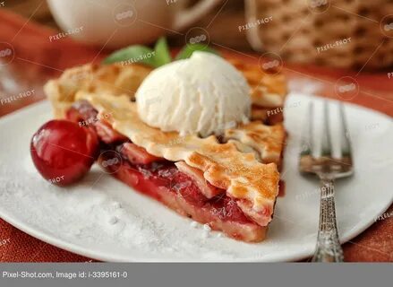 Delicious piece of cherry pie with ice cream on plate, closeup. 