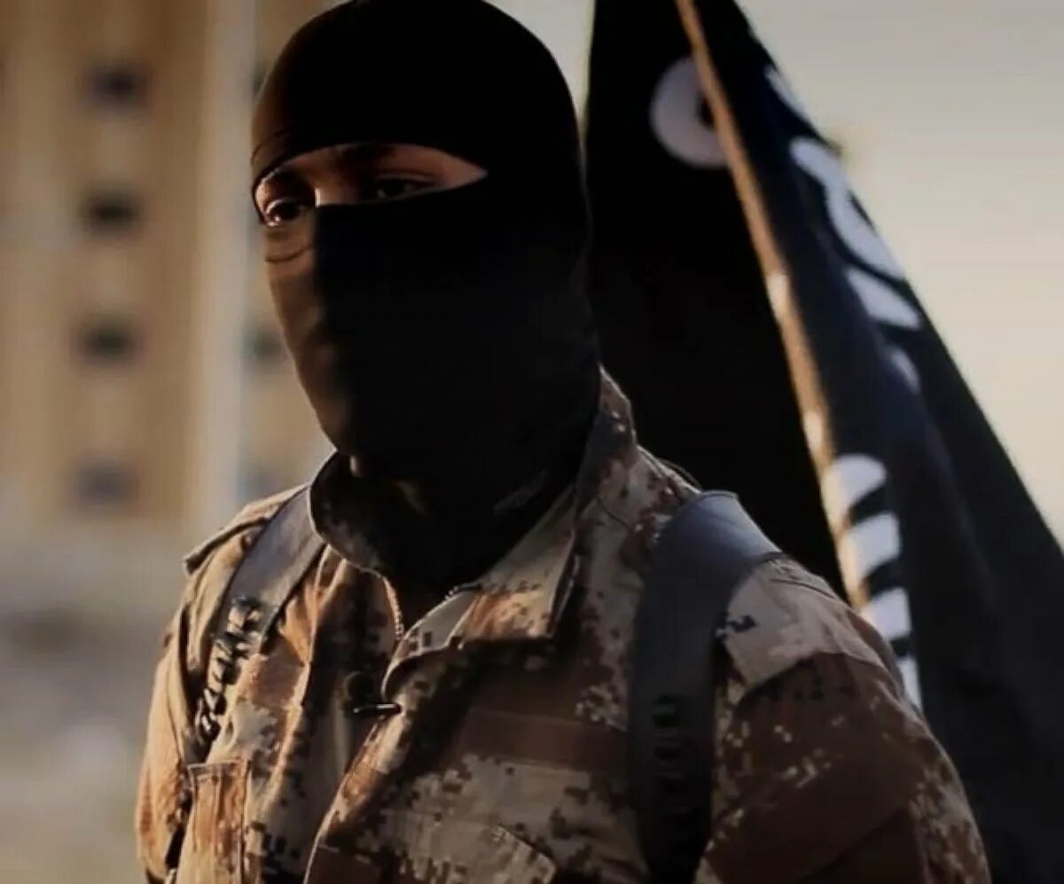 Исламский террорист в маске. Террор игил