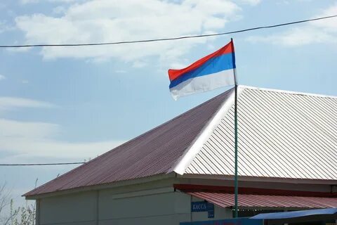 Флаг на частном доме