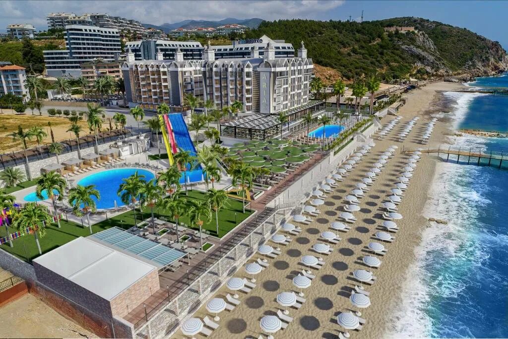 Granada luxury beach 5 турция аланья. Отель в турции кватро бич резорт. Турция отель lonicera world 4. Отель кватро бич алания. Гранада лакшери бич алания авсаллар.
