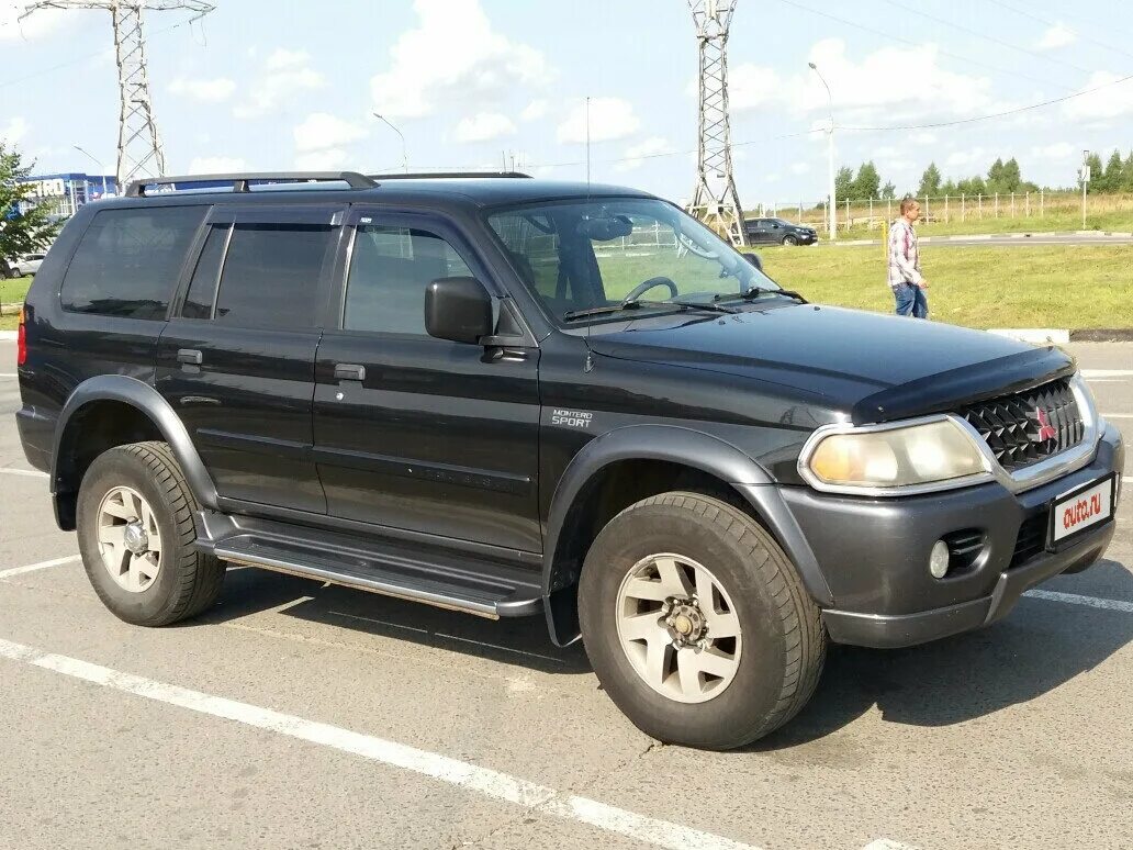 Mitsubishi montero 2001. Митсубиси Монтеро спорт 2001. Митсубиси Монтеро спорт 2001 черный. Mitsubishi Montero Sport 2001 года. Митсубиси Монтеро спорт 2001 3.0.