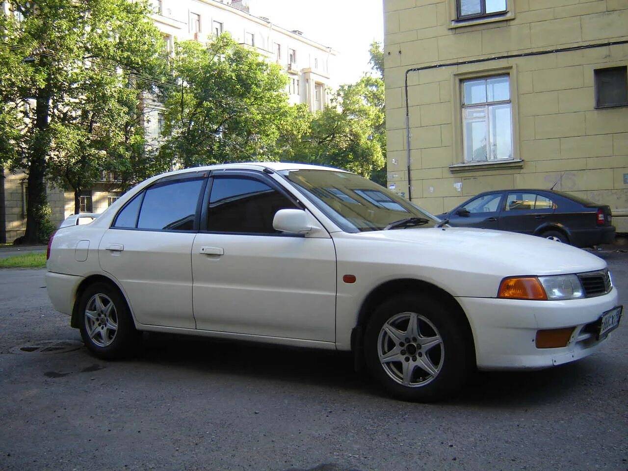 Mitsubishi Lancer 1998. Митсубиси Лансер 1998. Митсубиси ланцер 1998. Митсубиси Лансер Митсубиси Лансер 1998.