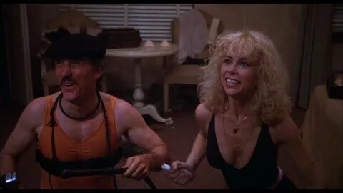 Dick Curtis and Elaine Joyce in Motel Hell (1980). 