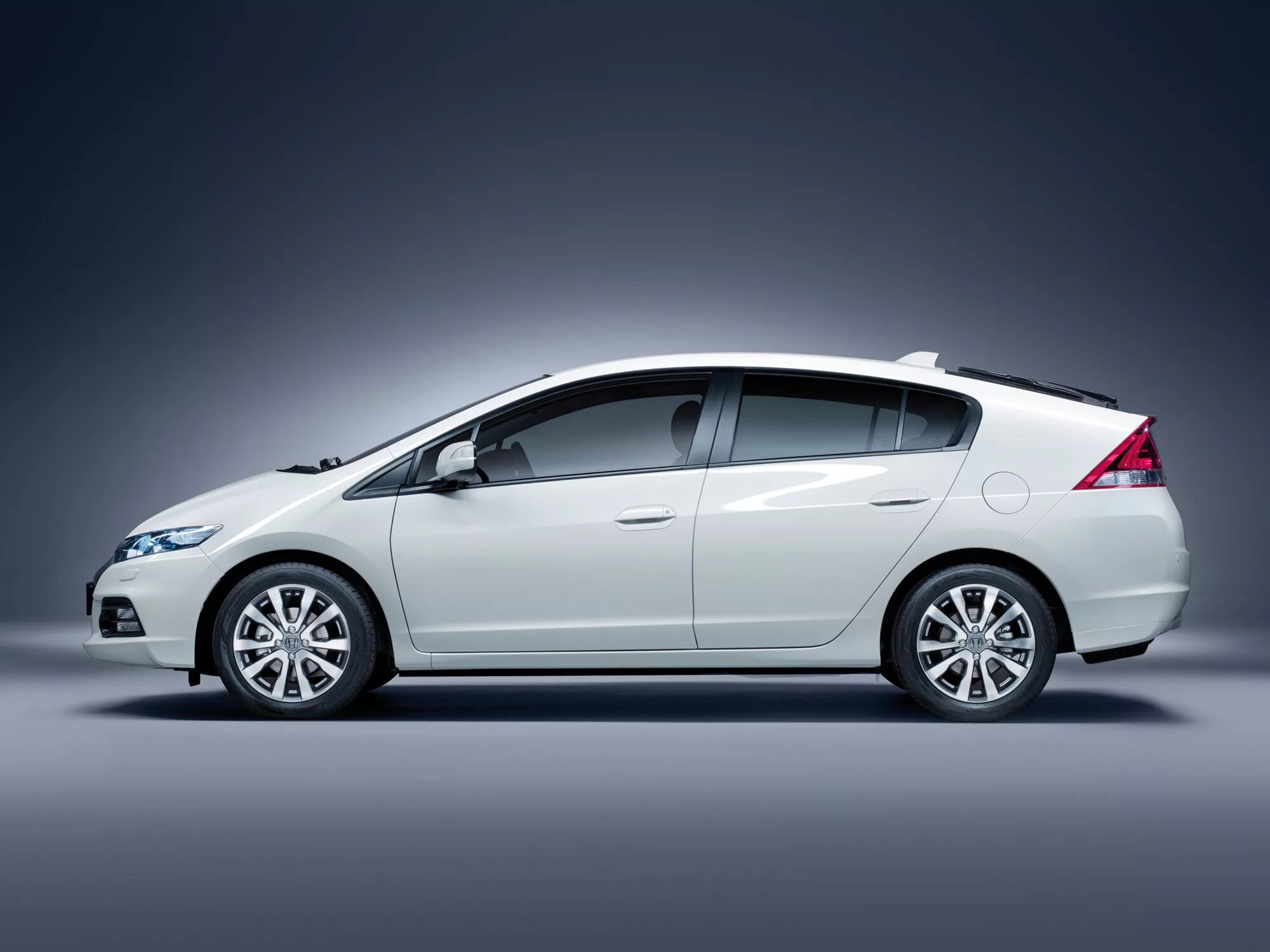 Honda ze2. Honda Insight ze2. Honda Insight 2010. Хонда Инсайт гибрид. Honda Insight Hybrid 2012.