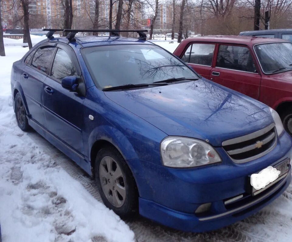 Багажник на шевроле лачетти универсал. Багажник Lux Лачетти седан. Chevrolet Lacetti седан багажник. Багажник на крышу Шевроле Лачетти седан. Рейлинги на Шевроле Лачетти седан.