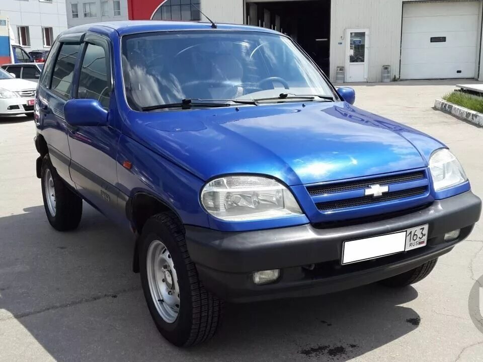 Шевроле нива цвет синий металлик. Chevrolet niva 2007 синяя. Нива шевроле 2123 цвет. Нива шевроле 2012 синяя. Niva chevrolet 2006 синий.