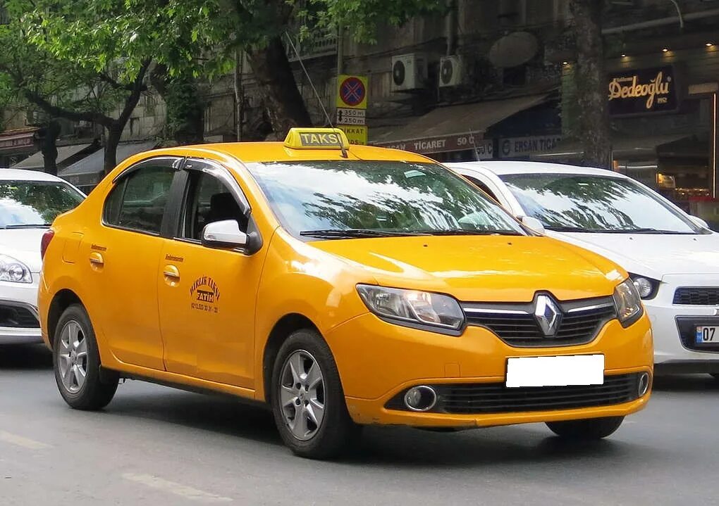 Такси через мфц. Renault Logan taksi. Renault Logan Yellow. Renault Logan желтый. Рено Логан 2 такси.