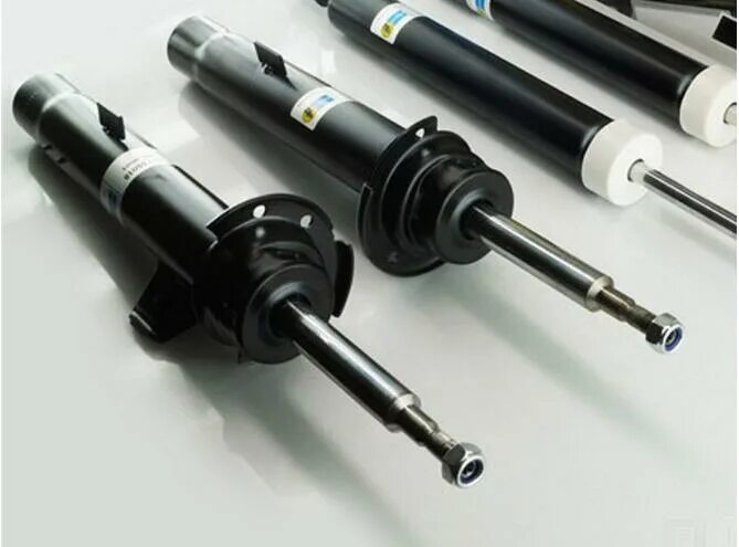 Амортизаторы на бмв е39 4. Передние стойки бмв е39. Передний амортизатор е39 bils. Задние стойки bmw e39. Амортизатор передний е39.