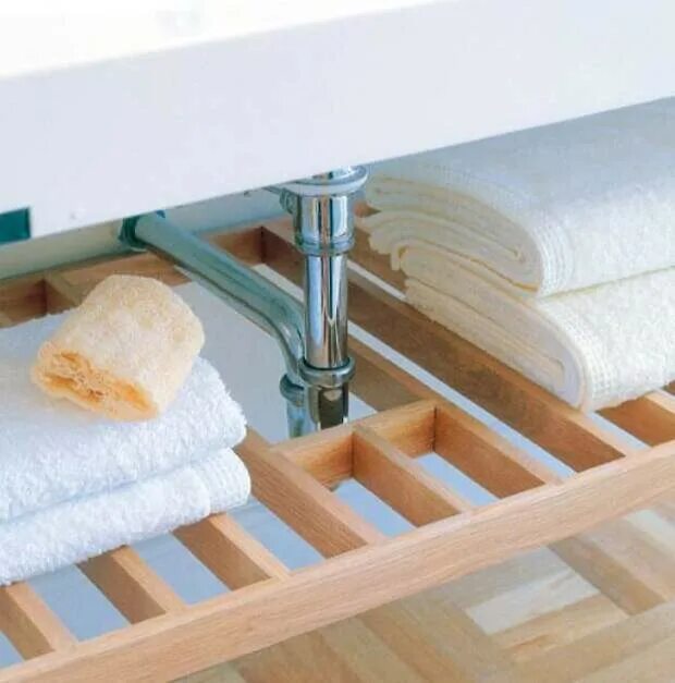 Полотенцедержатели для ванной комнаты. Полка для полотенец под раковину. Полка в ванну для полотенец. Полки для хранения полотенец в ванной. Полотенце раковина