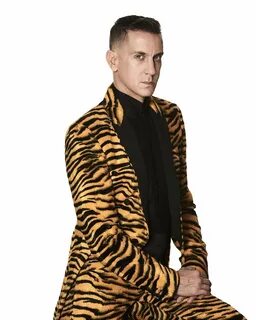 I included this photo of Jeremy Scott not only due to the fact his suit is ...