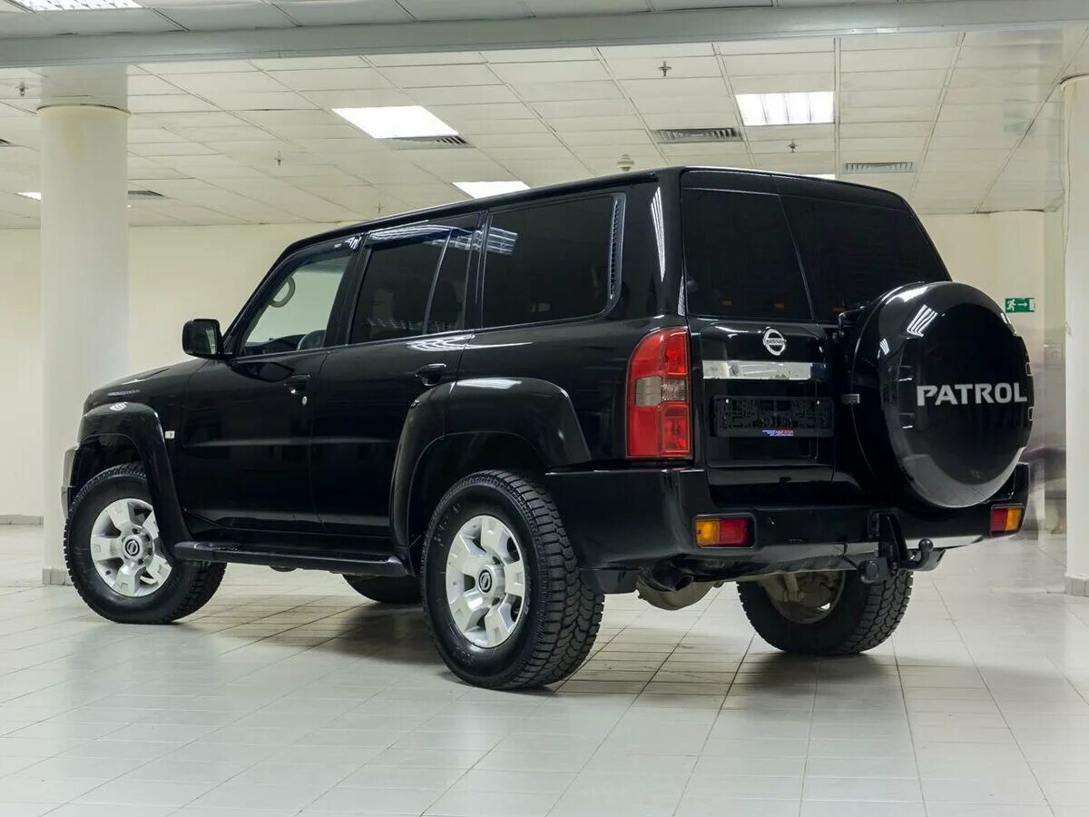 Патрол y61 рестайлинг. Nissan patrol y61. nissan patrol y61 черный. nissan patrol y61 1997.