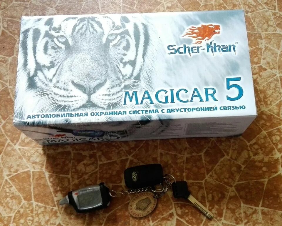 Scher khan magicar отключить. Scher Khan Magicar 5. Сигнализация с автозапуском Шерхан магикар 5. Шерхан магикар 5 автозапуск. Брелок Scher Khan Magicar 5 автозапуск.