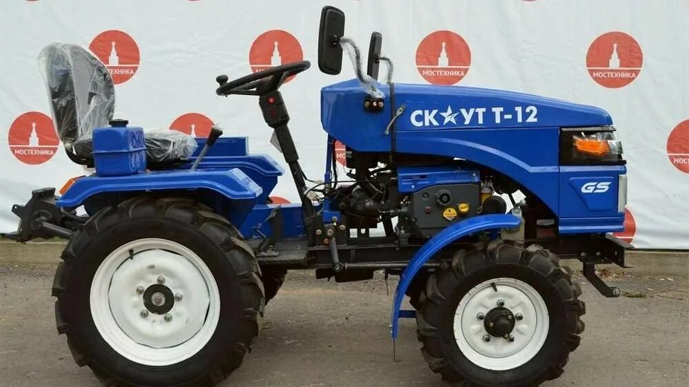 марка двигателя скаут т 12. задние колеса на кмз 012. кмз 013. трактор скаут т12. лыткаринец т12 минитрактор.