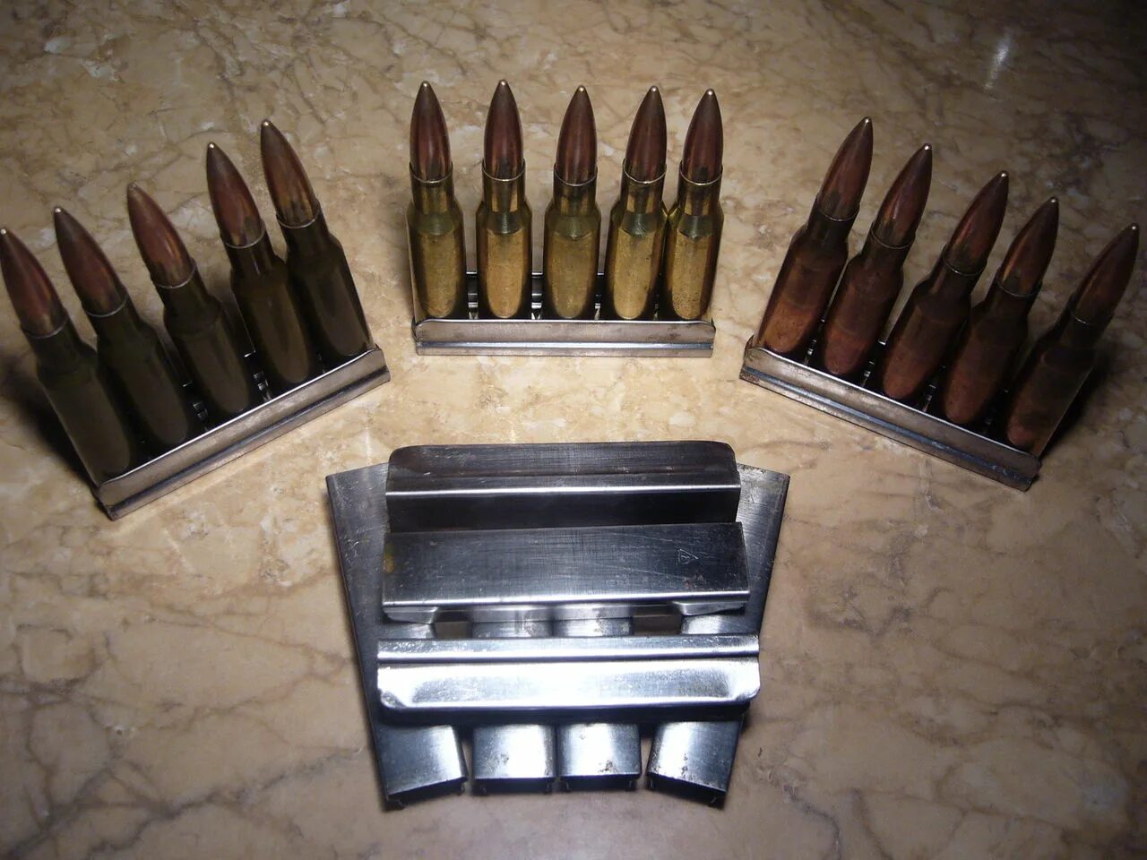 62x54r 10 stl. Обойма 18х28х10. 92 57 мм маузер. P208g обойма от маузера. Обойма патронов.