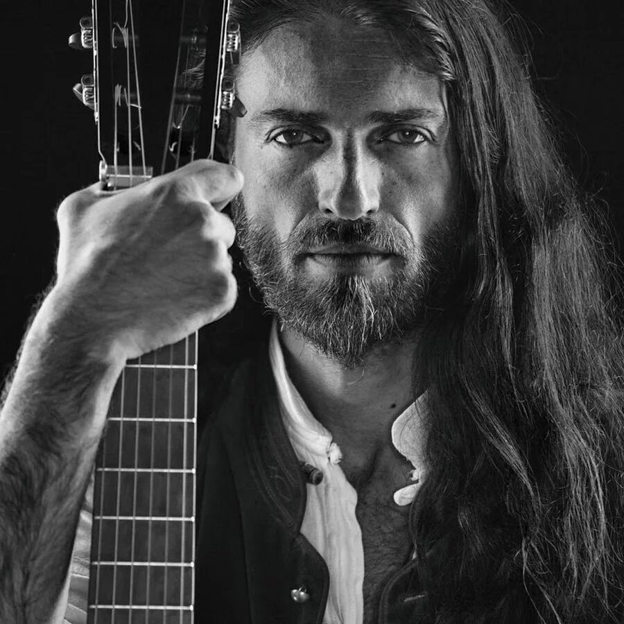 Эстас тонне с гитарой. Гитарист тони эстас. Гитарист тони эстас. "estas tonne" && ( исполнитель | группа | музыка | music | band | artist ) && (фото | photo). Гитарист виртуоз эстас.