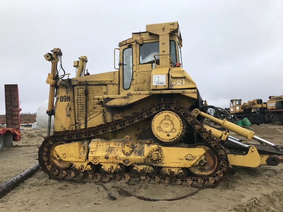 Бульдозер Катерпиллер d9. Катерпиллер бульдозер 9. Бульдозер Caterpillar d9r. Бульдозер Cat d9n.