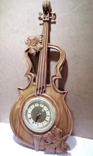 Часы скрипка