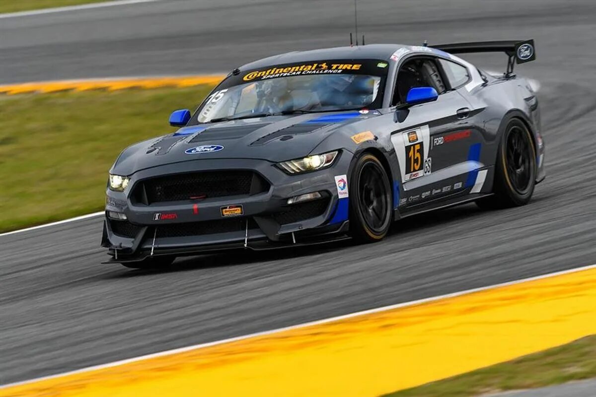 Mustang gt3. Форд Мустанг gt4. Ford Mustang gt4 Race car. Форд Мустанг gt гоночная.