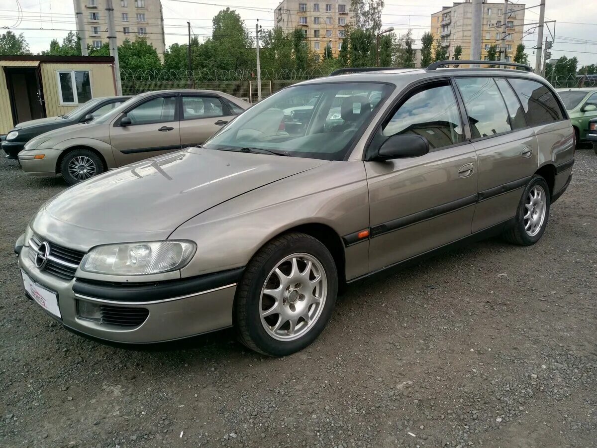 Куплю опель омега б универсал. Opel Omega b 1996. Opel Omega 1996. Опель Омега универсал 1996. Опель Омега 1996 2.5.