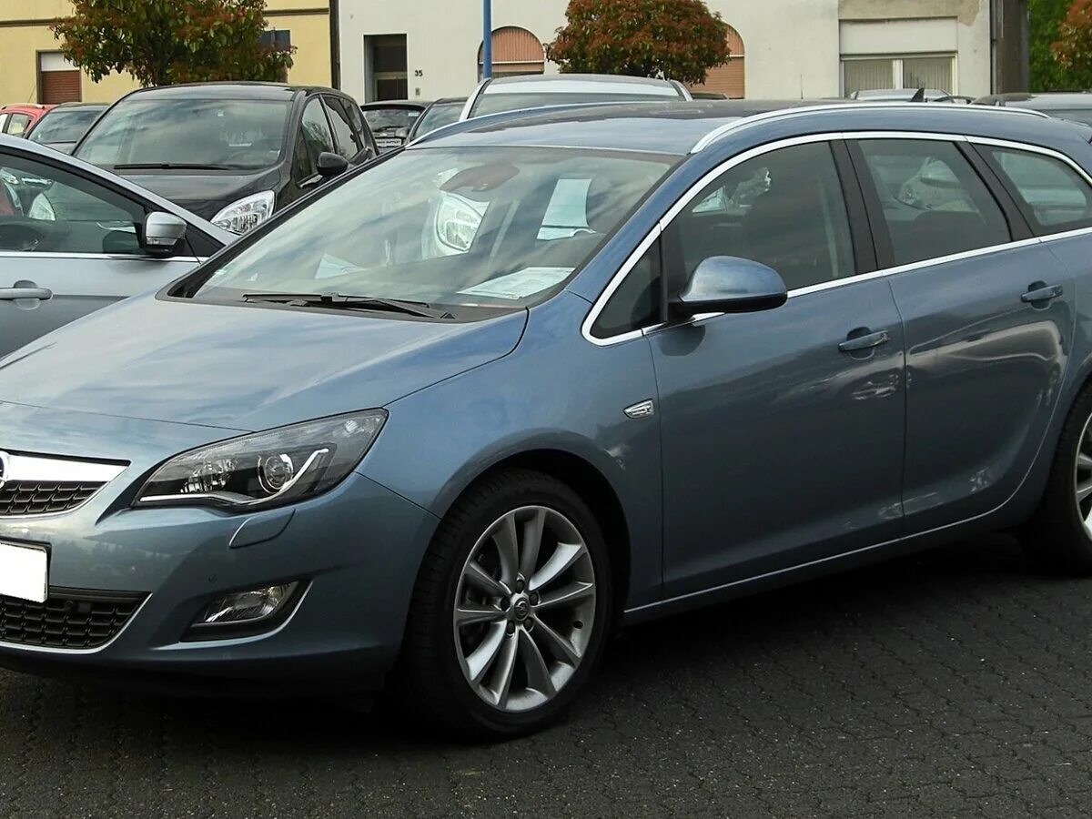 Opel Astra универсал 2011. Opel Astra j универсал. Opel Astra j 2012 универсал.