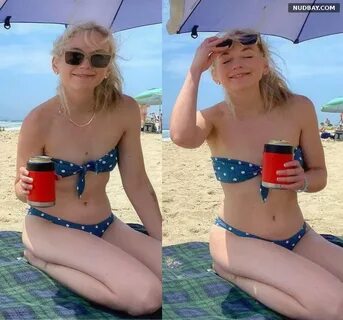 Emily Kinney wearing a bikini at the beach Jul 25 2021.