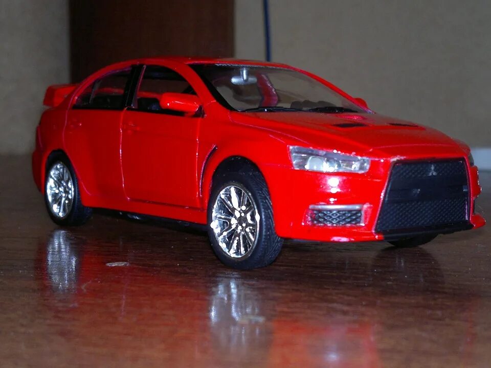 Модель 1 10 купить. Моделька Mitsubishi Lancer 10. Моделька Лансер 10. Митсубиси Лансер x моделька. Модель Мицубиси Лансер 10 Волошина игрушка.