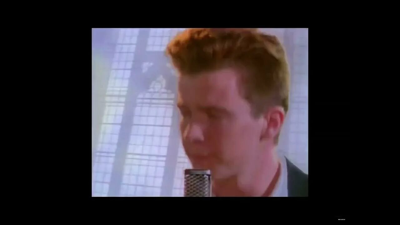 Рик Эстли рикролл. Рик Эстли Невер гона. Рик Эстли never gonna give. Rick Astley 2009. Что такое рикрол