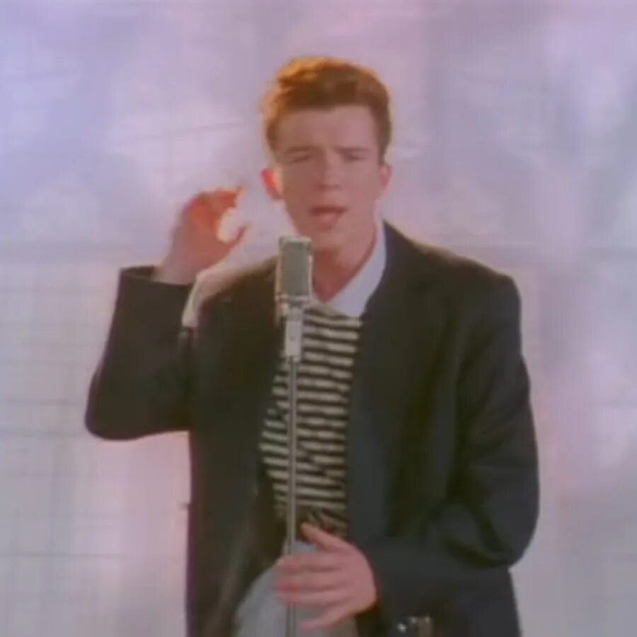 Рик Эстли рикролл. Рик Эстли never gonna. Рик Эстли never gonna гиф. Rick Astley 1993. Рикролл звук