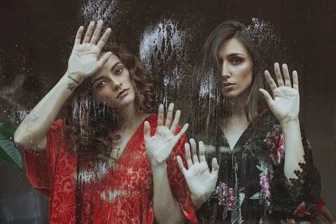 2 girls and 1 glass