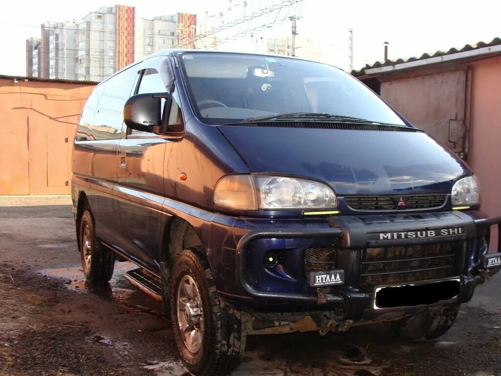 Митсубиси делика бу купить. Mitsubishi Delica 1996. Delica 1996 левый руль. Митсубиси Делика левый руль. Мицубиси минивэн 1996 года.