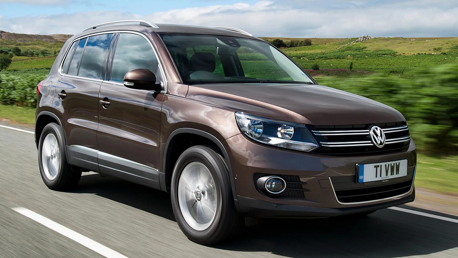 Купить автомобиль фольксваген тигуан. VW Tiguan 2015. Фольксваген Тигуан 2015. Кроссовер Фольксваген Тигуан. Фольксваген Тигуан 2014.