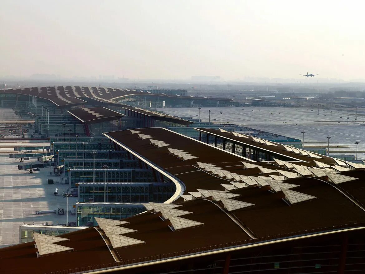 Какой самой большой аэропорт в мире. Международный аэропорт Шоуду, Китай. Пекинский аэропорт Дасин. Beijing аэропорт 2023.