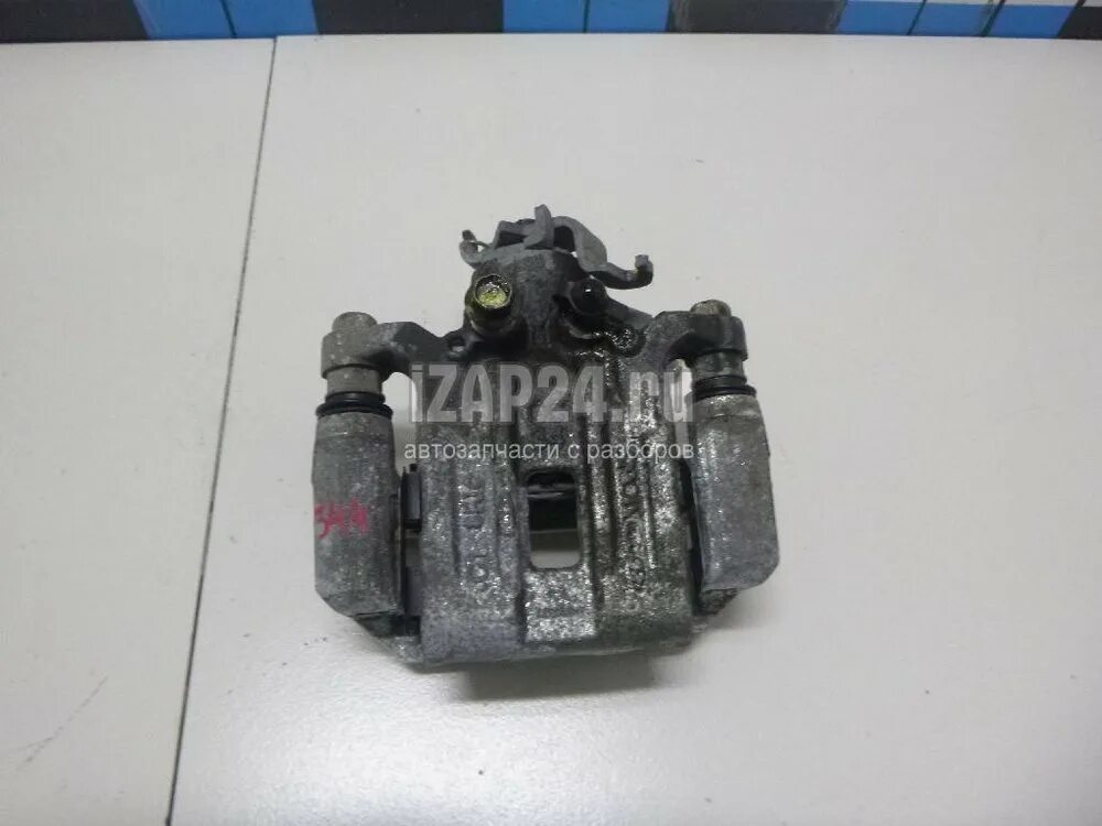 Суппорт хендай крета. Устройство заднего суппорта хендай крета. 58230-2e300. 58311m0a10. Задний суппорт хендай крета.