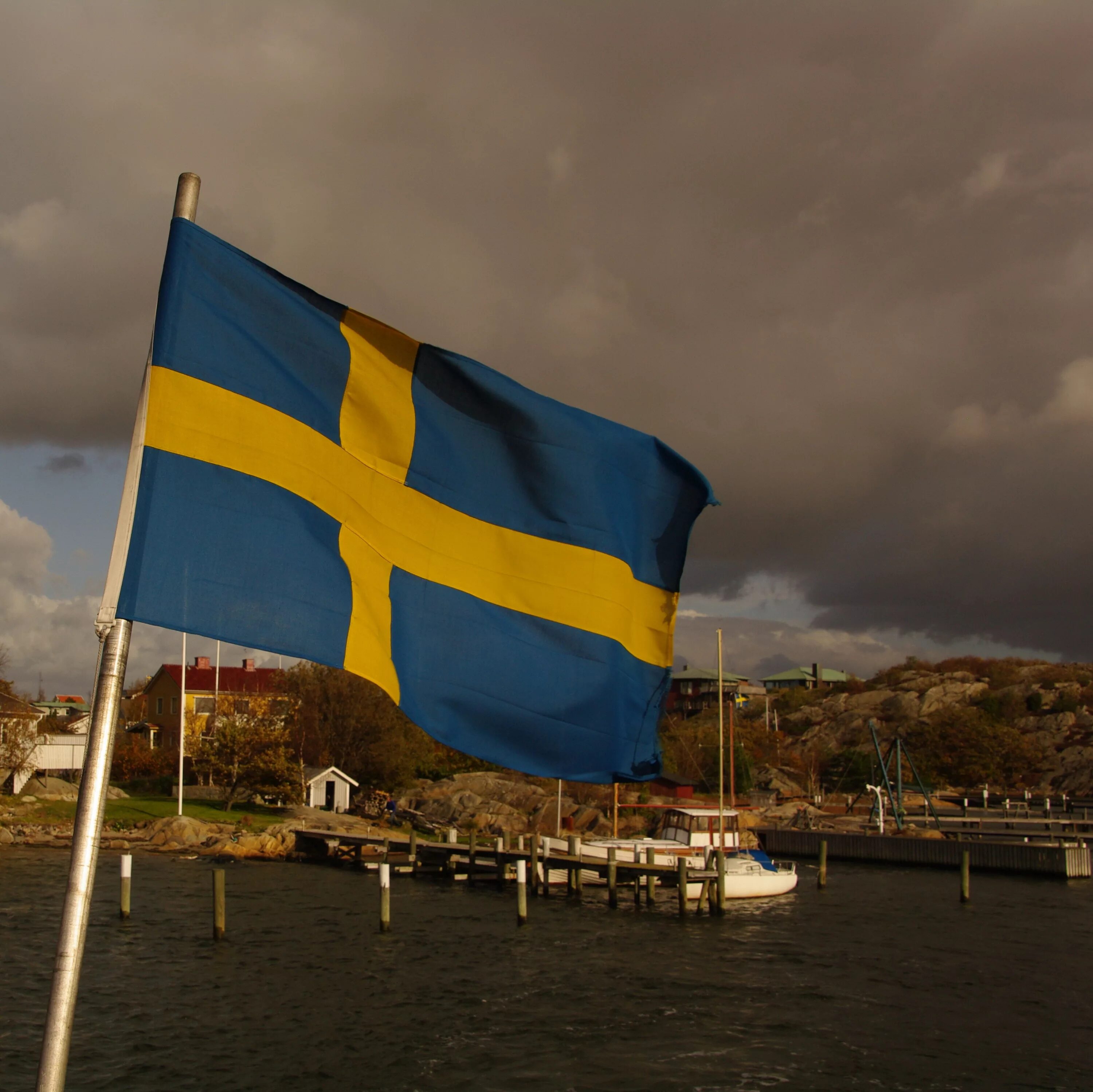 Интересные факты про швецию. Флаг Швеция. Stockholm флаг. Стокгольм Швеция флаг. Шведский флаг.