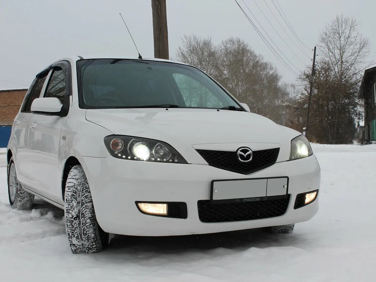 Куплю мазду 2003 год. Мазда Демио 2003. Mazda Demio, 2003 год. Мазда Демио 2003 белая. Мазда Демио 2003 год белая.