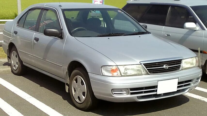 Ниссан санни 14 кузов. Nissan Sunny b14. Nissan Sunny 1997. Nissan Sunny b14 1997. Ниссан Санни ex Saloon 1998.